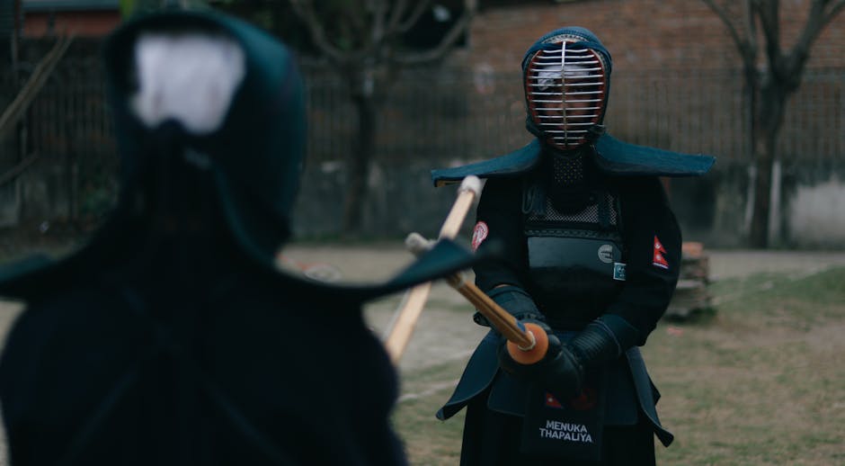 Two kendo practitioners sparring outdoors in traditional armor, focusing on technique and discipline.